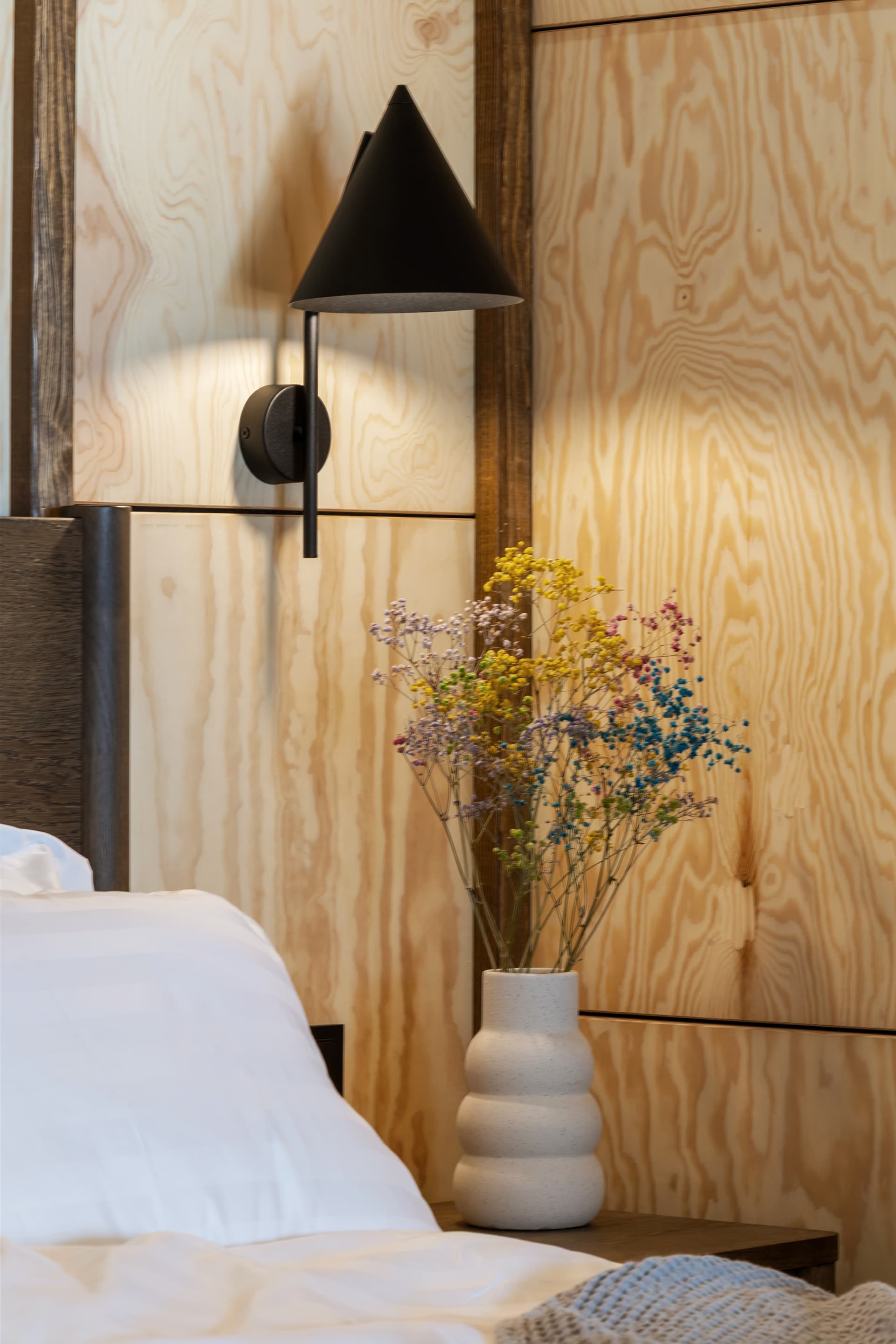 Bedroom decor with wall lamp