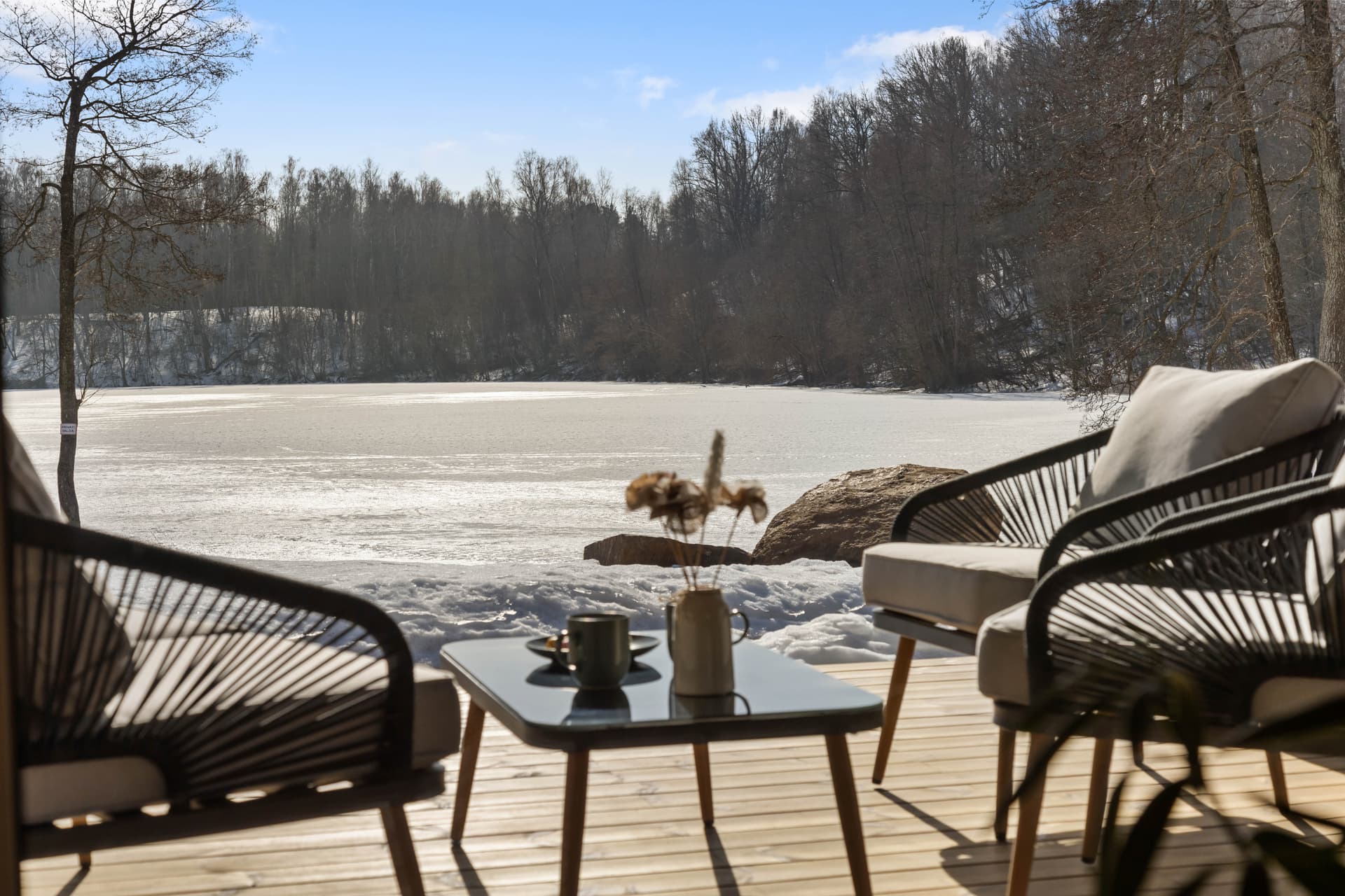 Terrace chairs facing the lake