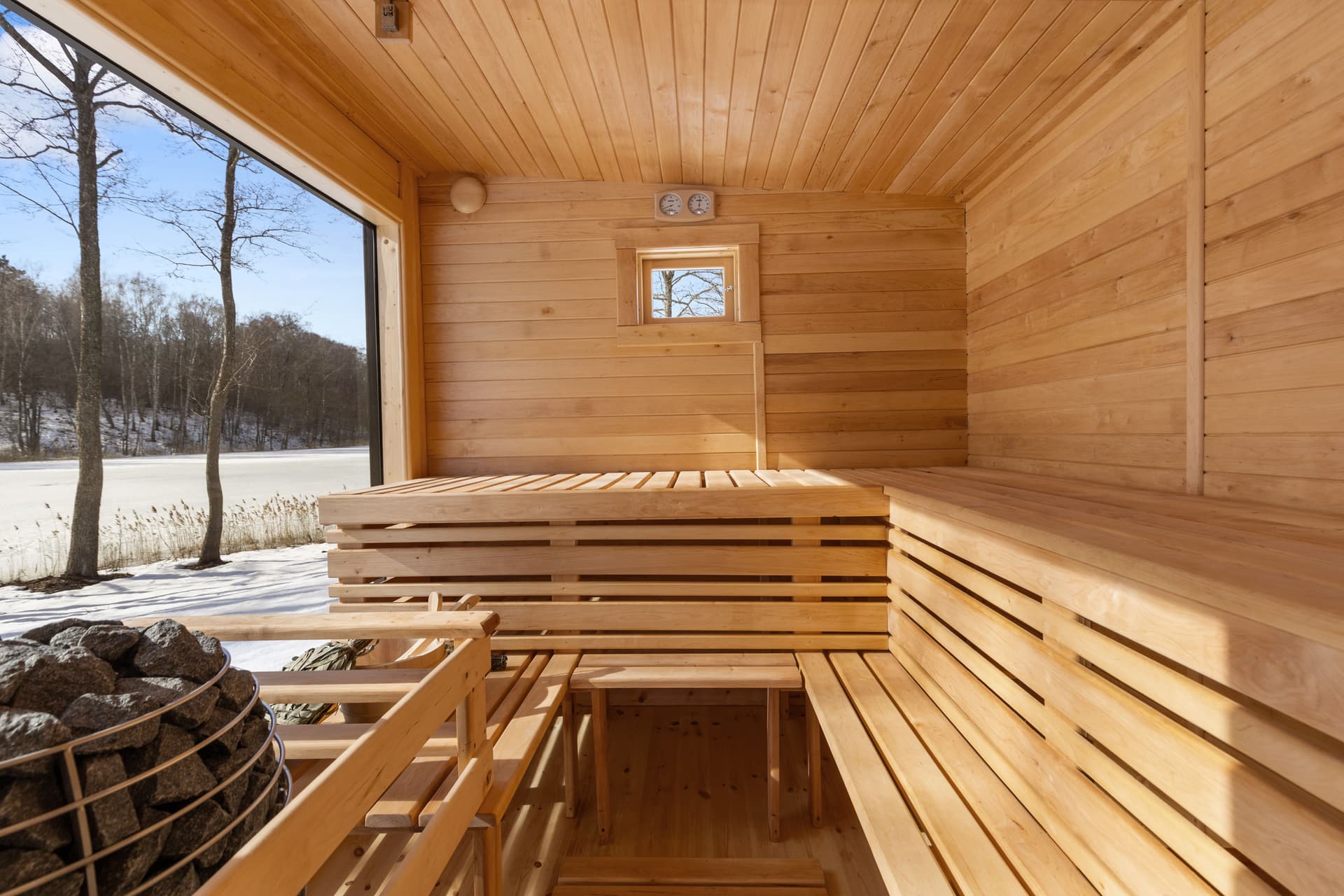 Sauna interior with lake window